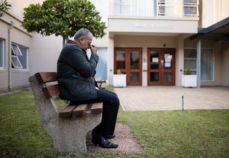 nursing-home-sad-man-outside.jpg